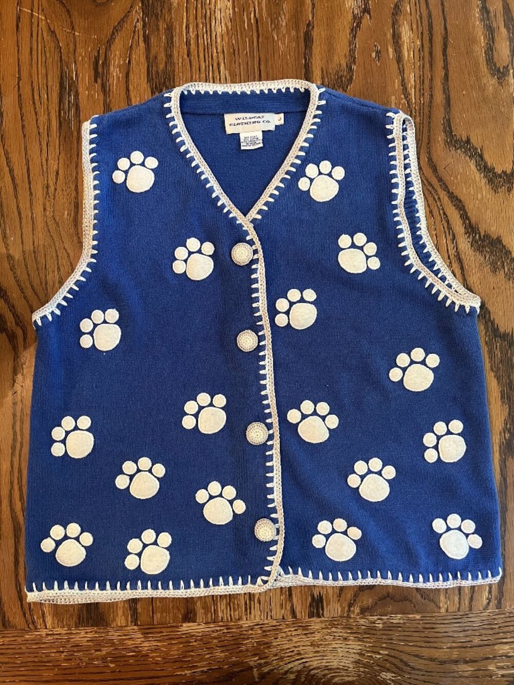 Vintage UK Wildcat Clothing Co. Blue Knit Sweater Vest With White Paw Print Wome